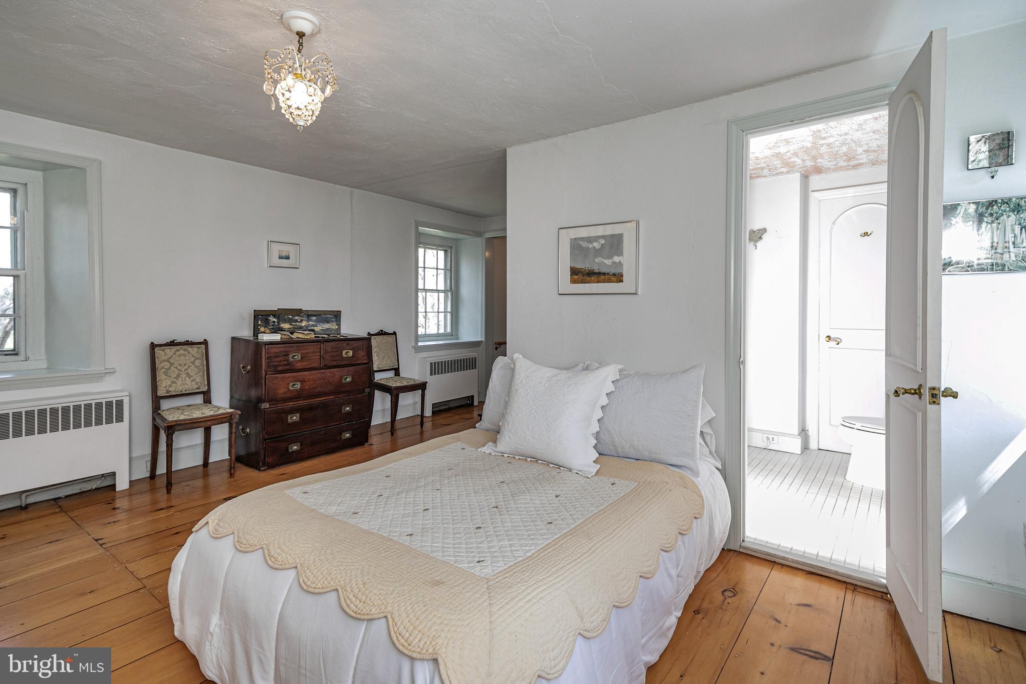 210 Cold Soil Road Princeton, NJ 08540 - Photo 30 of 37 a bed room with furniture and wooden floor
