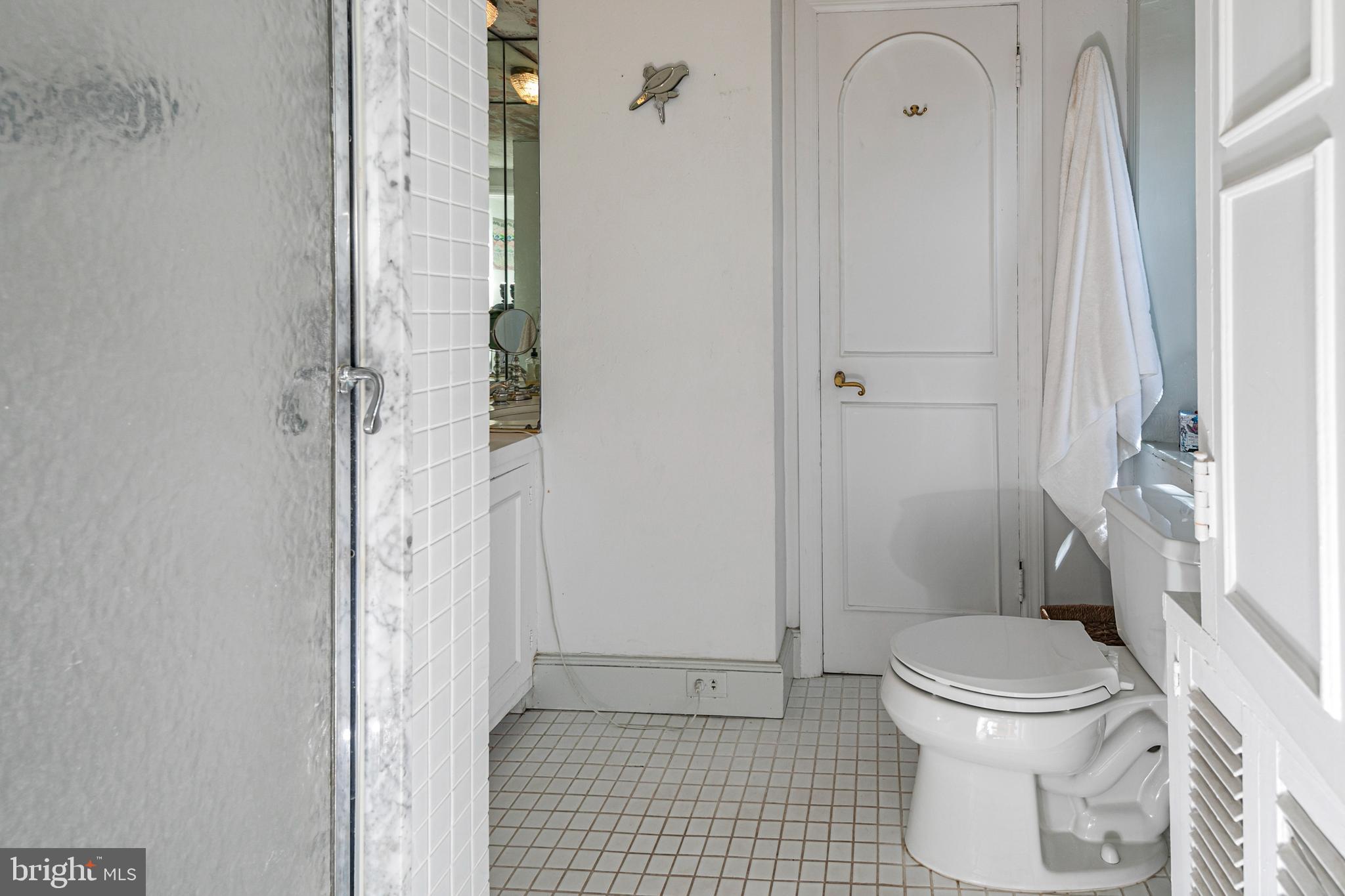 210 Cold Soil Road Princeton, NJ 08540 - Photo 31 of 37 a bathroom with a toilet and a shower