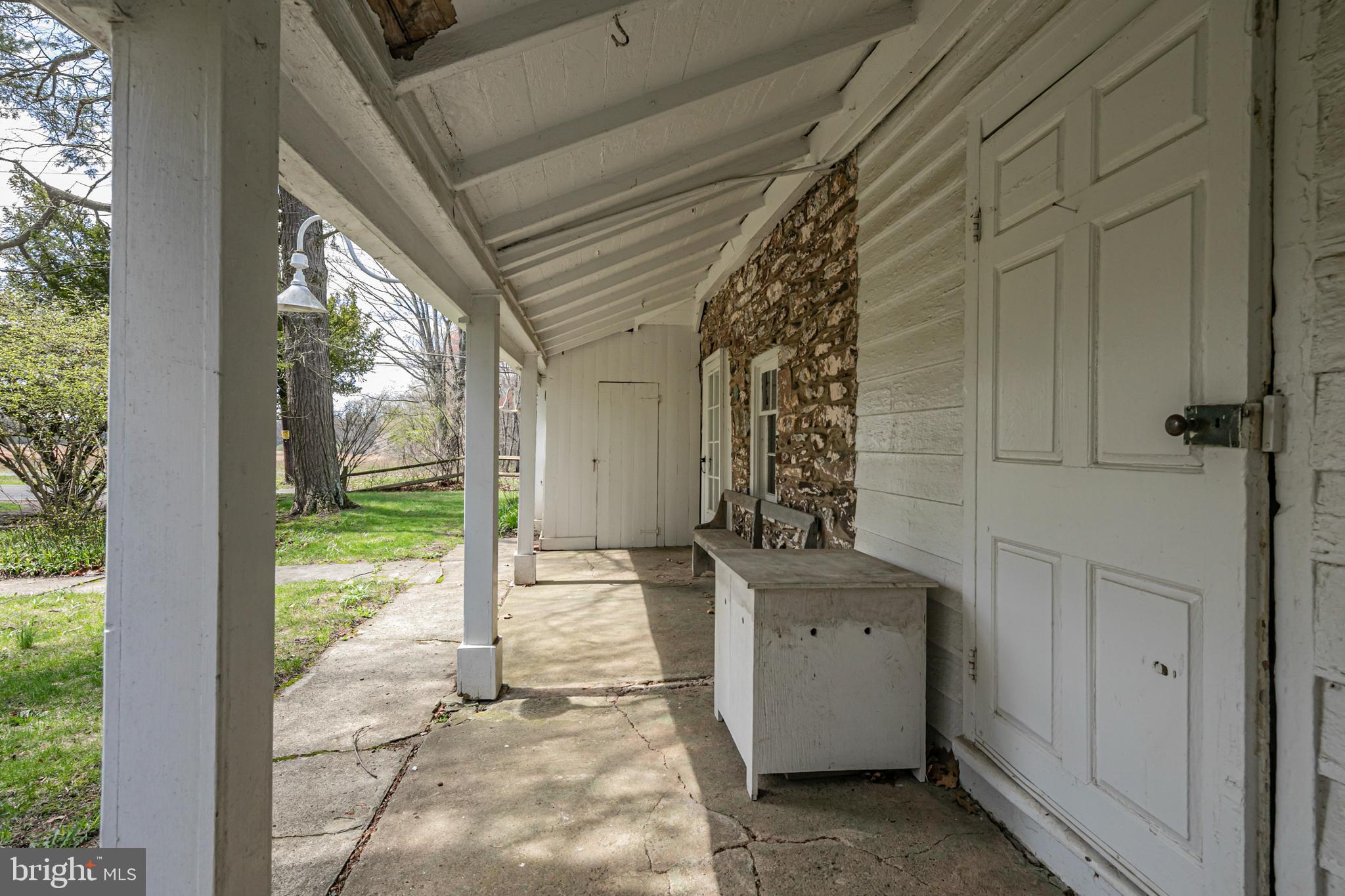 210 Cold Soil Road Princeton, NJ 08540 - Photo 4 of 37 a view of a porch with furniture