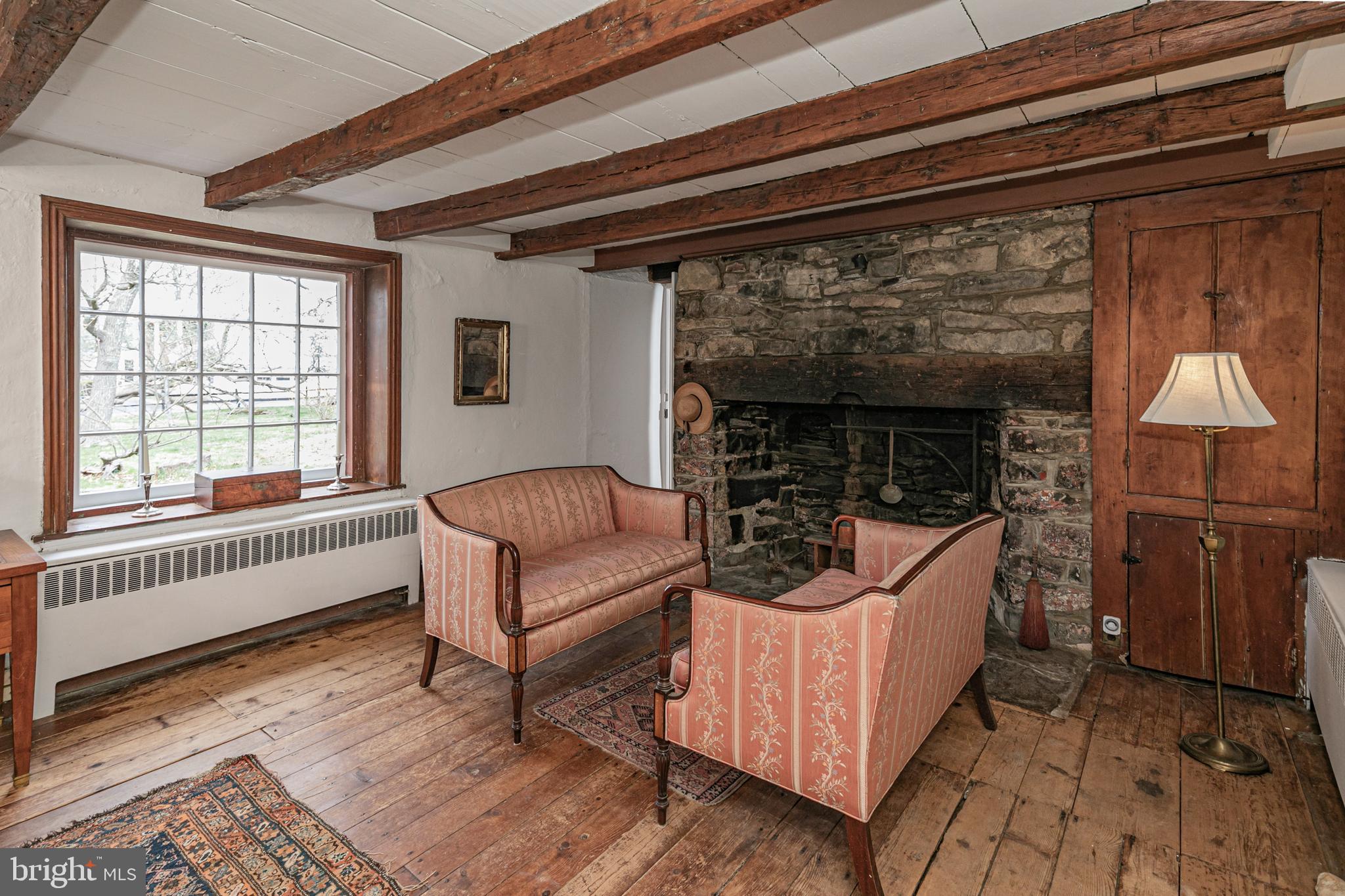 210 Cold Soil Road Princeton, NJ 08540 - Photo 6 of 37 a living room with furniture and a fireplace