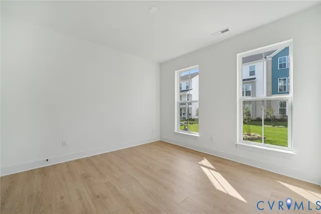 an empty room with windows