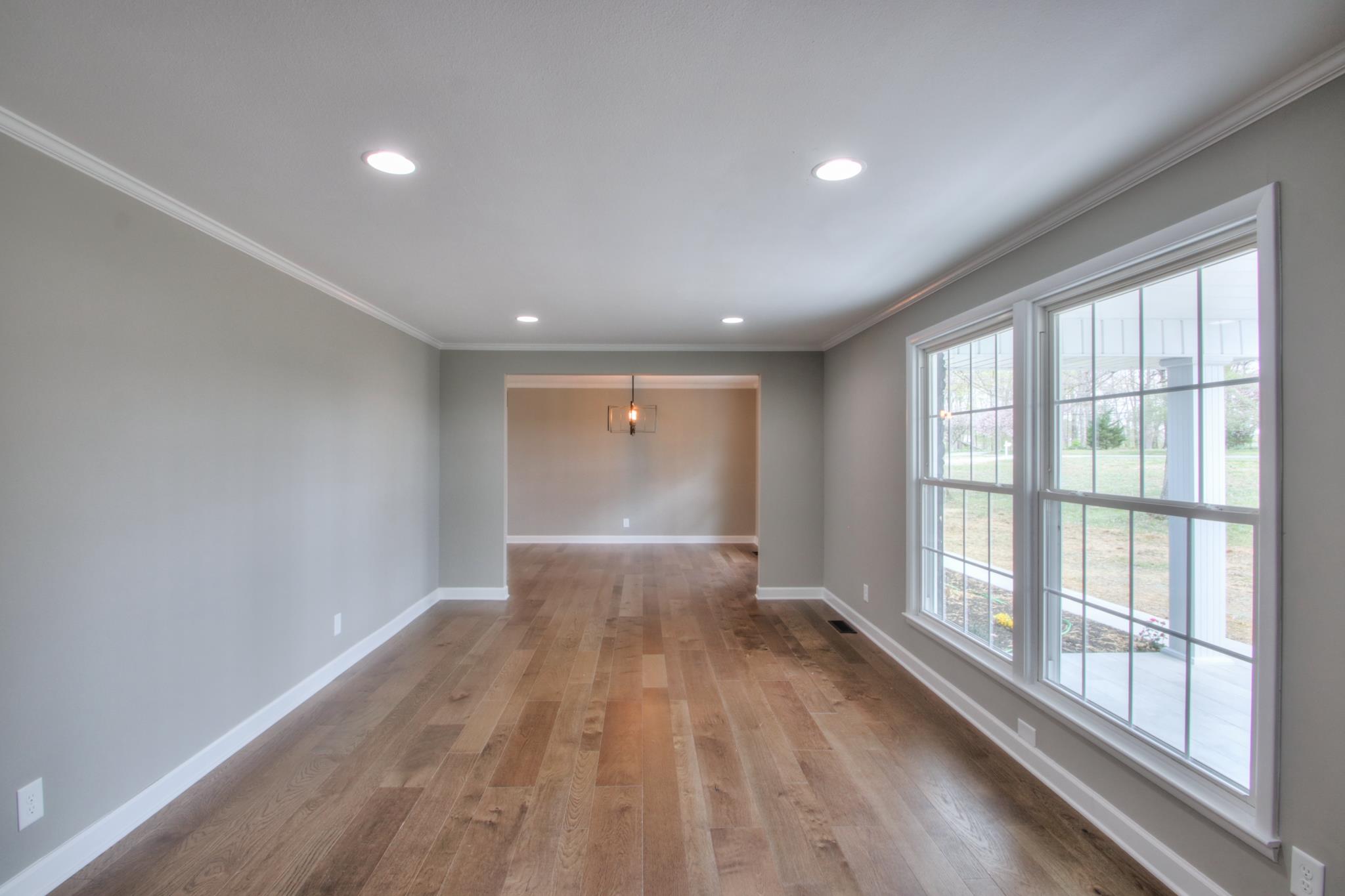 2964 Logan Road Greenbrier, TN 37073 - Photo 14 of 28 a view of an empty room with wooden floor and a window