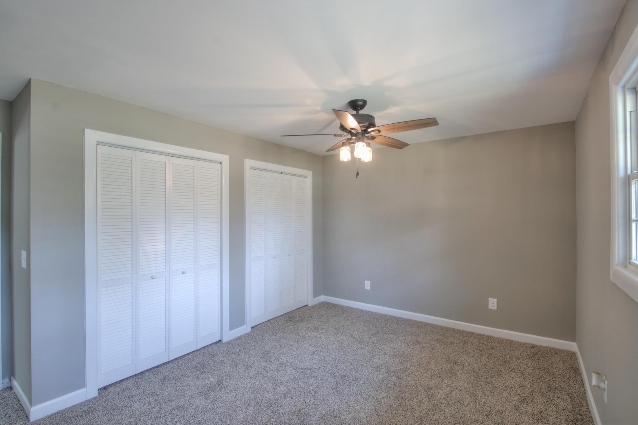2964 Logan Road Greenbrier, TN 37073 - Photo 23 of 28 a view of a chandelier fan in a room