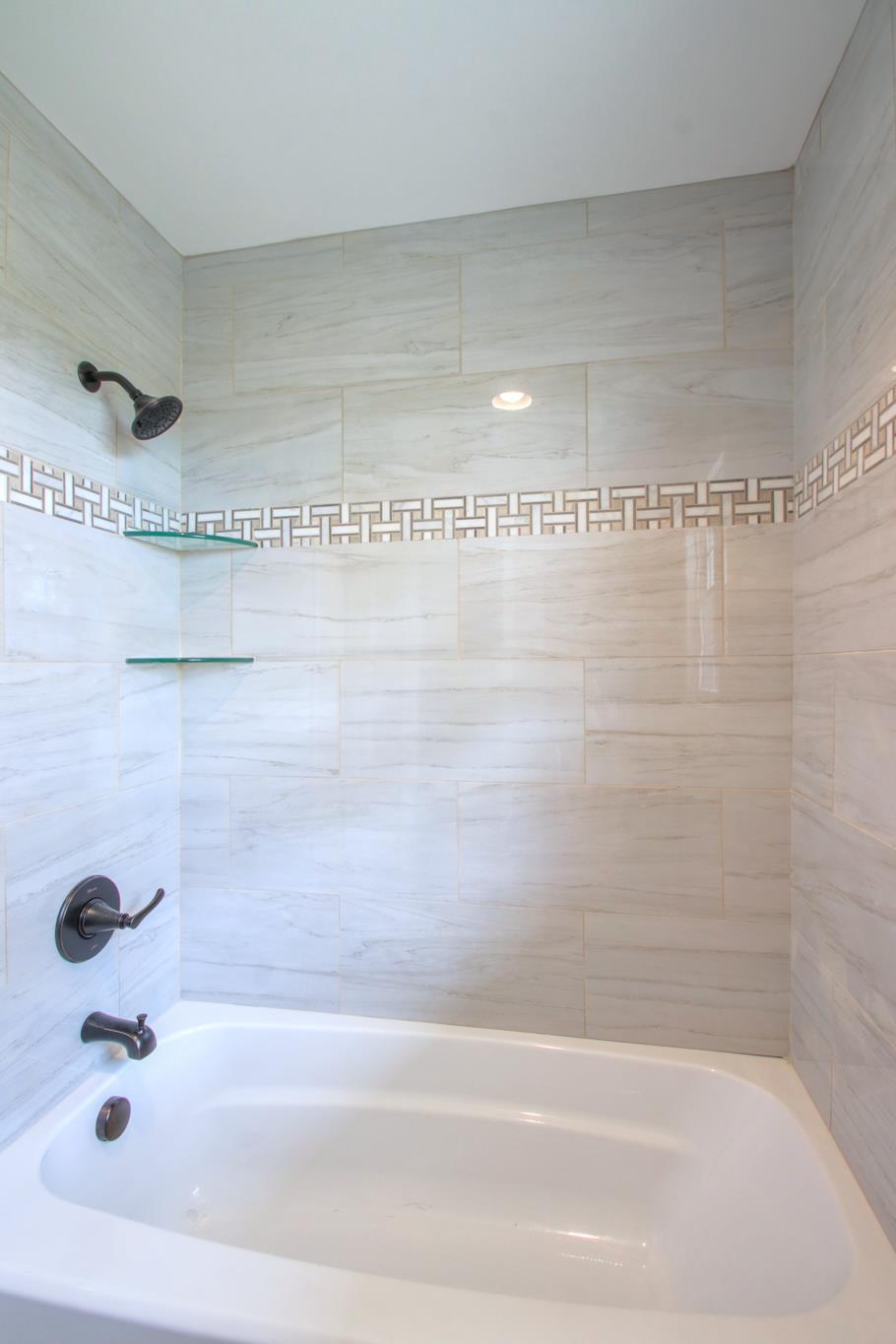 2964 Logan Road Greenbrier, TN 37073 - Photo 26 of 28 a bathroom with a bathtub