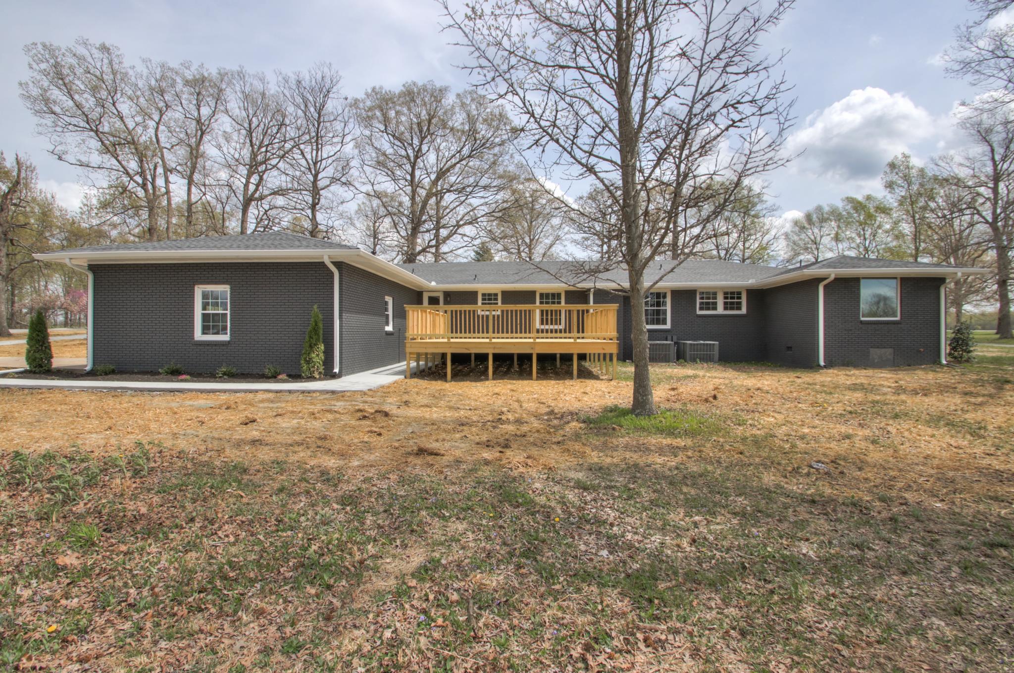 2964 Logan Road Greenbrier, TN 37073 - Photo 6 of 28 front view of a house with a yard