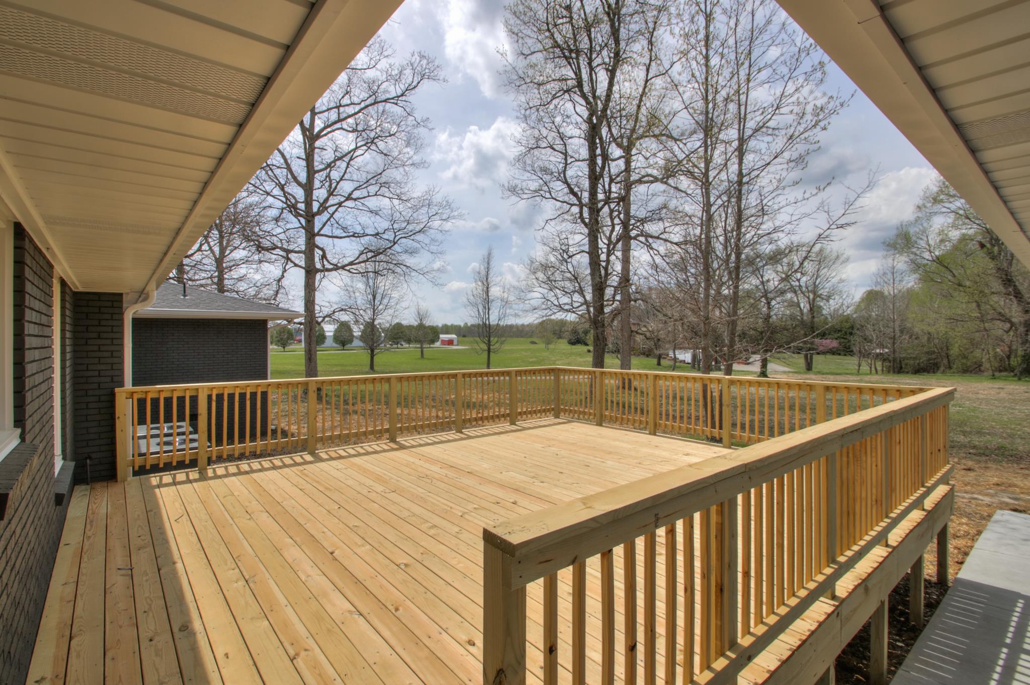 2964 Logan Road Greenbrier, TN 37073 - Photo 7 of 28 a view of balcony with wooden floor and fence