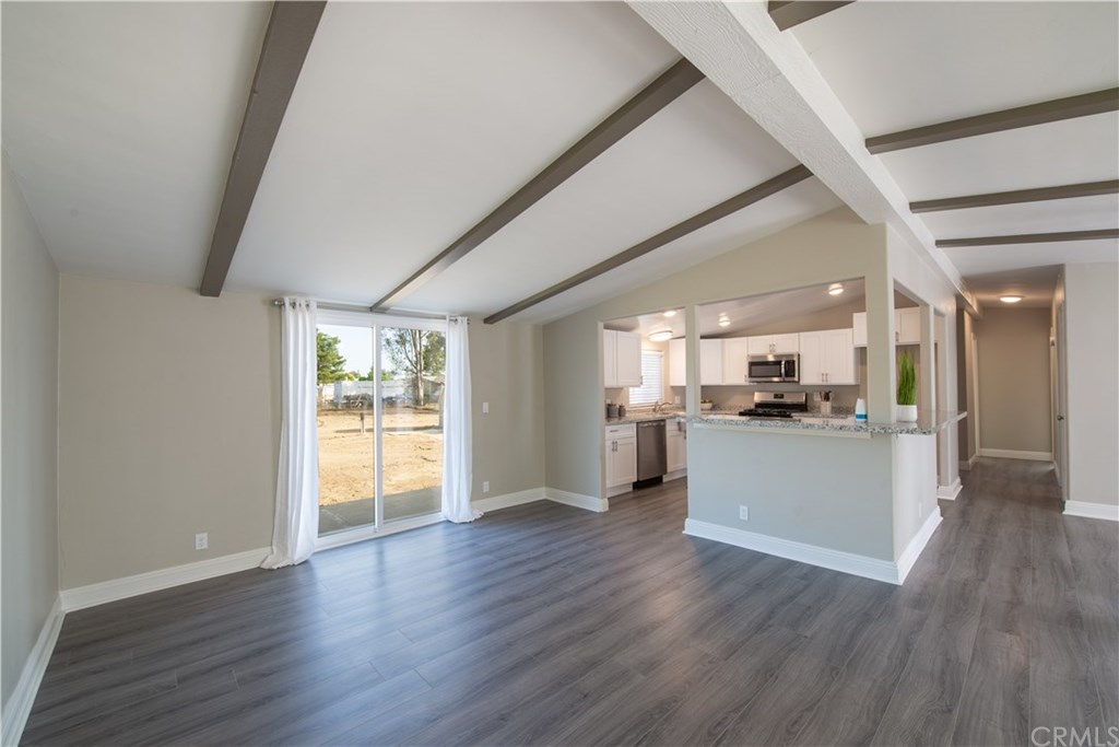 32785 Batson Lane Wildomar, CA 92595 - Photo 8 of 21 Rear room that can be used as a dining room or a separage family room. Slider door has step down to back patio