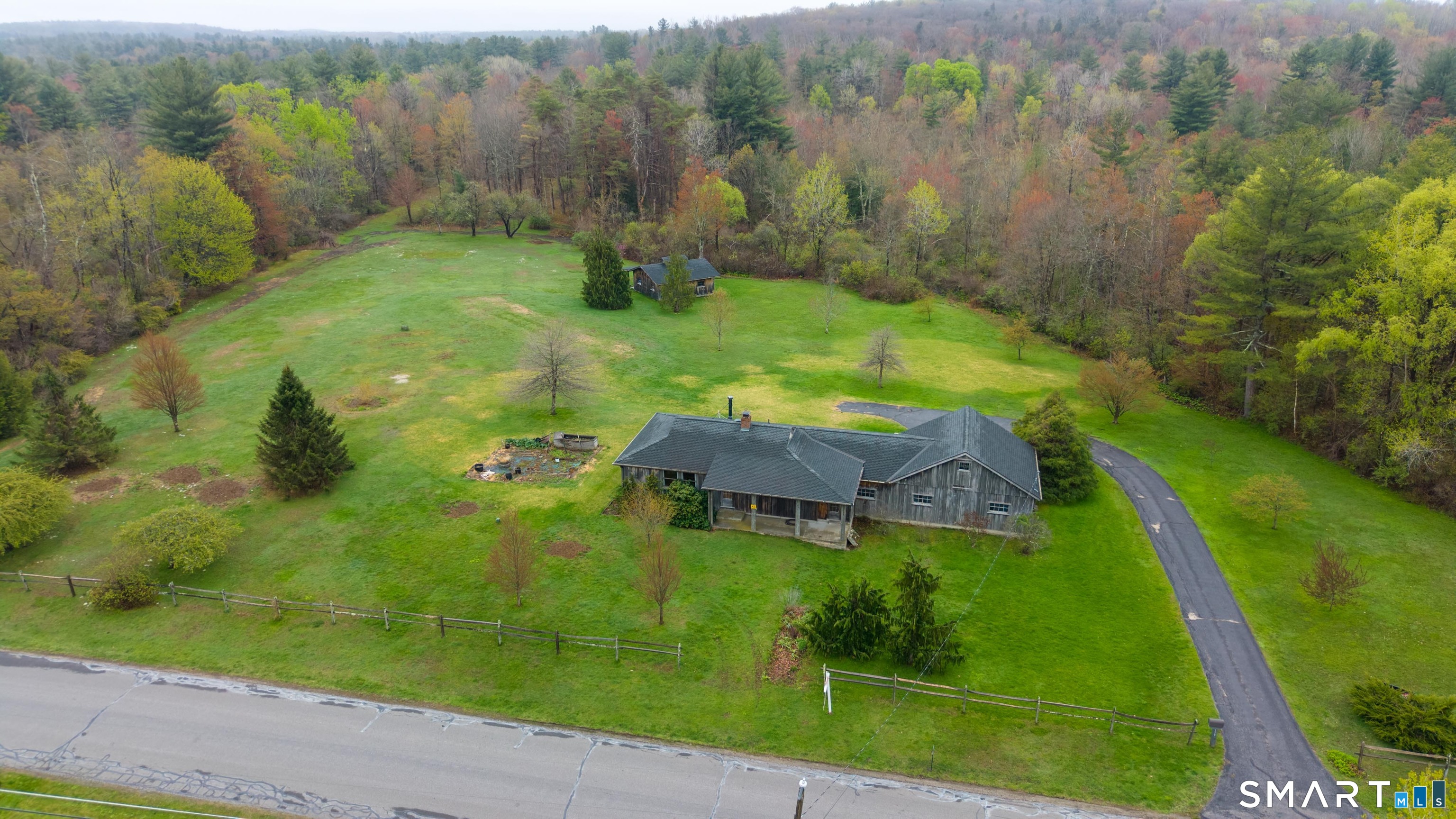 139 West Side Road Goshen, CT 06756 - Photo 4 of 17 an aerial view of a house with a yard