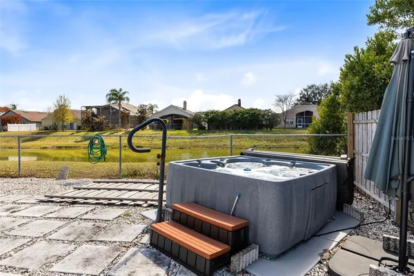 a view of a park with large trees