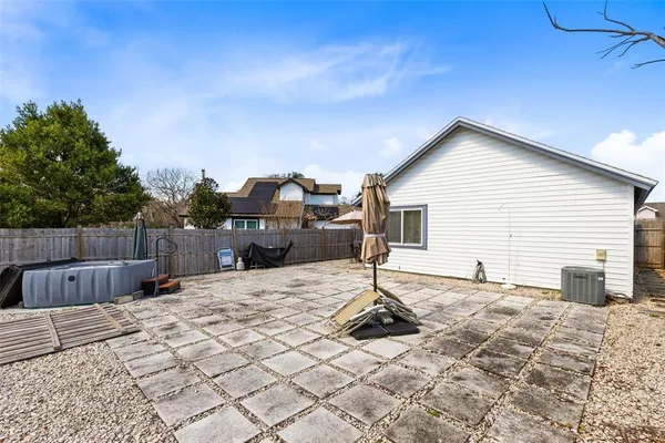 a front view of a house with a patio