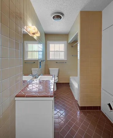 a bath room with a window