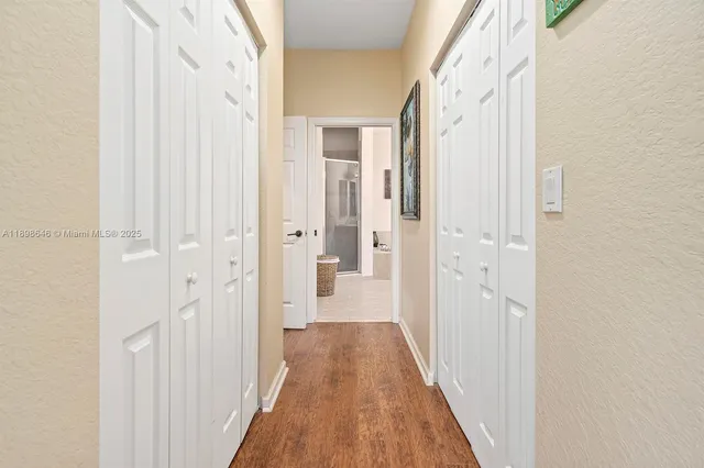 a view of a bathroom from the hallway