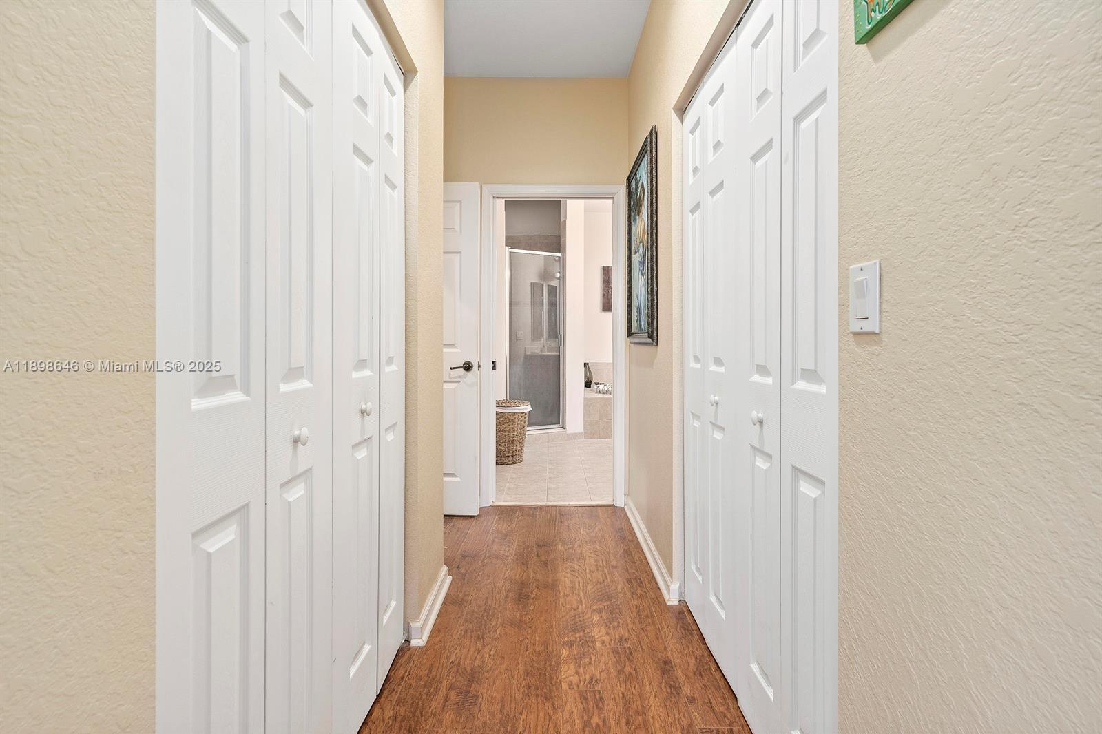 7550 Southwest Herrington Lane, Unit 7550 Stuart, FL 34997 - Photo 18 of 23 a view of a bathroom from the hallway