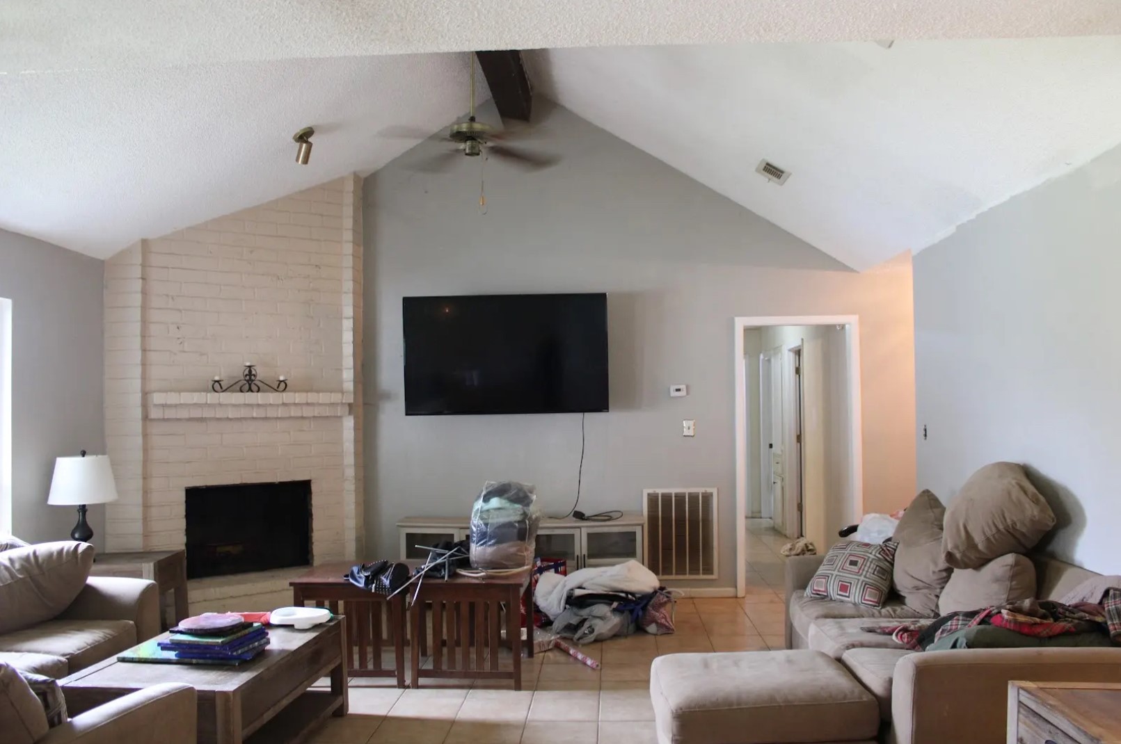 32056 South Wiggins Street Magnolia, TX 77355 - Photo 4 of 6 a living room with furniture or fireplace and a flat screen tv