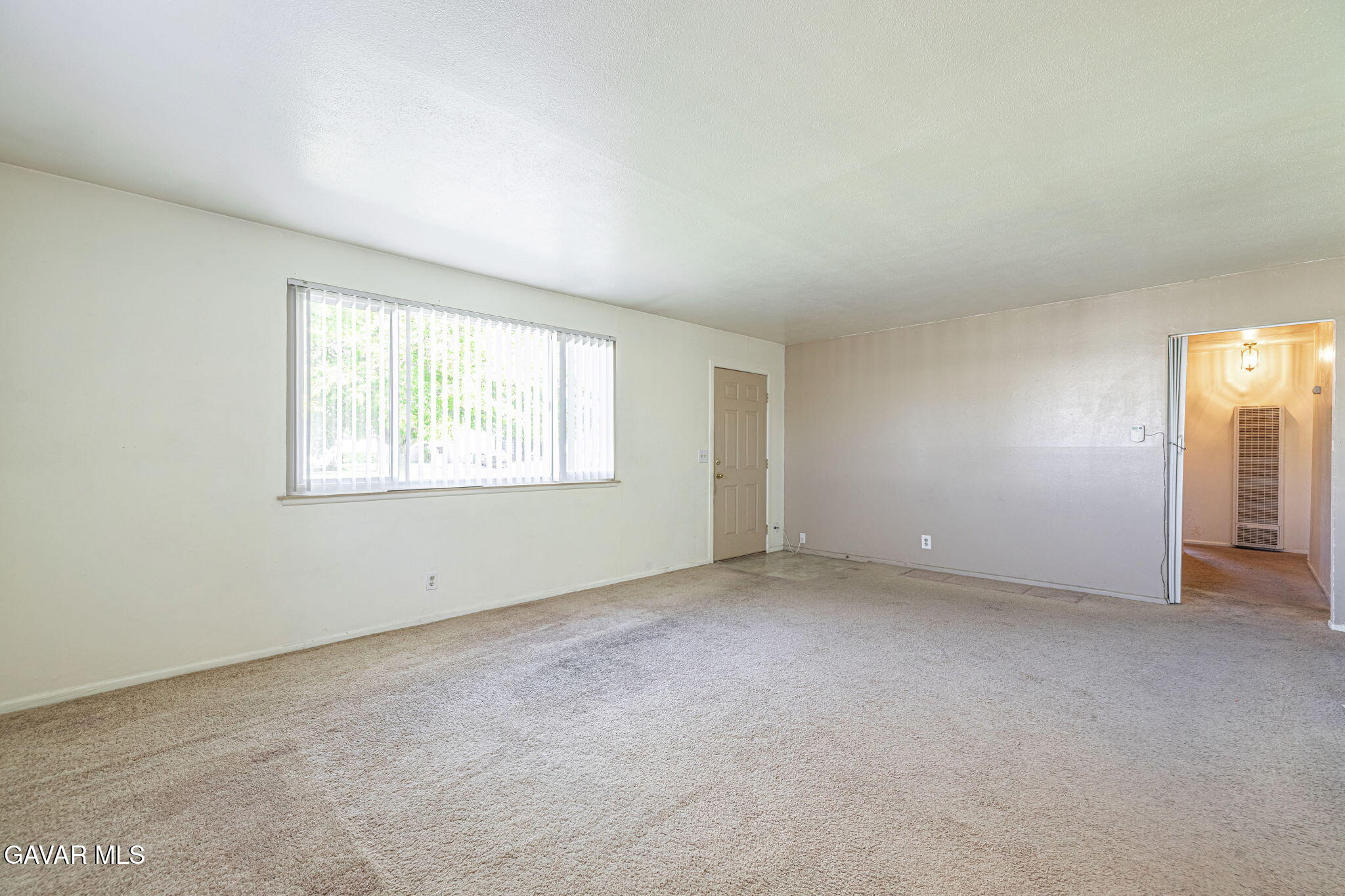 45309 Newtree Avenue Lancaster, CA 93534 - Photo 12 of 35 an empty room with windows