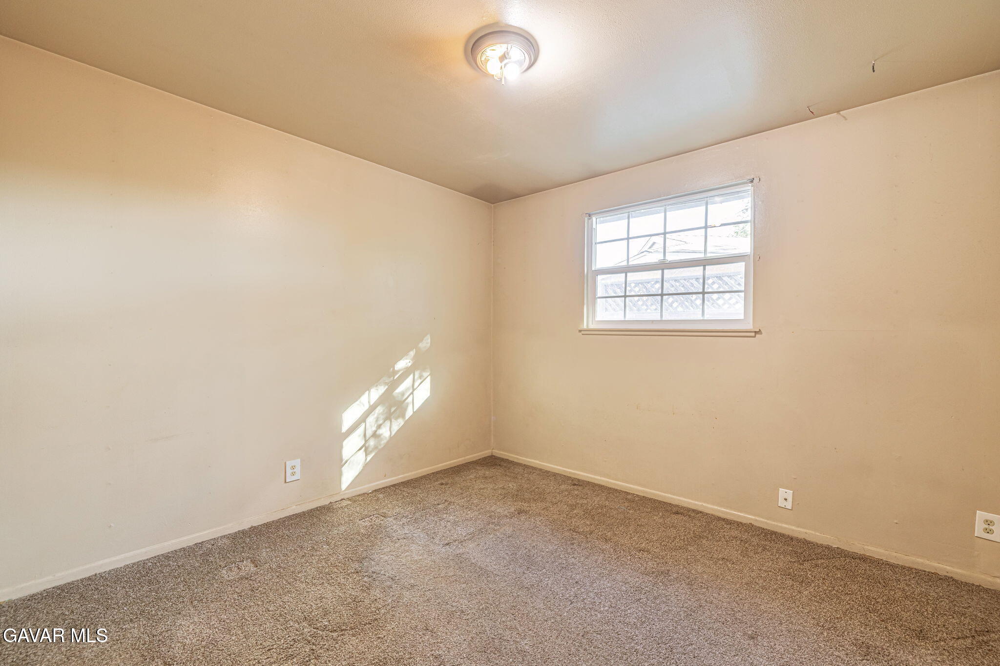 45309 Newtree Avenue Lancaster, CA 93534 - Photo 22 of 35 an empty room with a empty space and a window