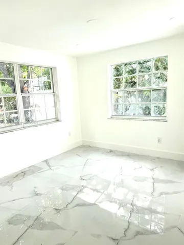 a view of a large window with an outdoor space