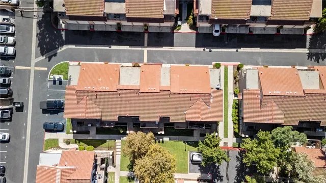 an aerial view of a house with swimming pool