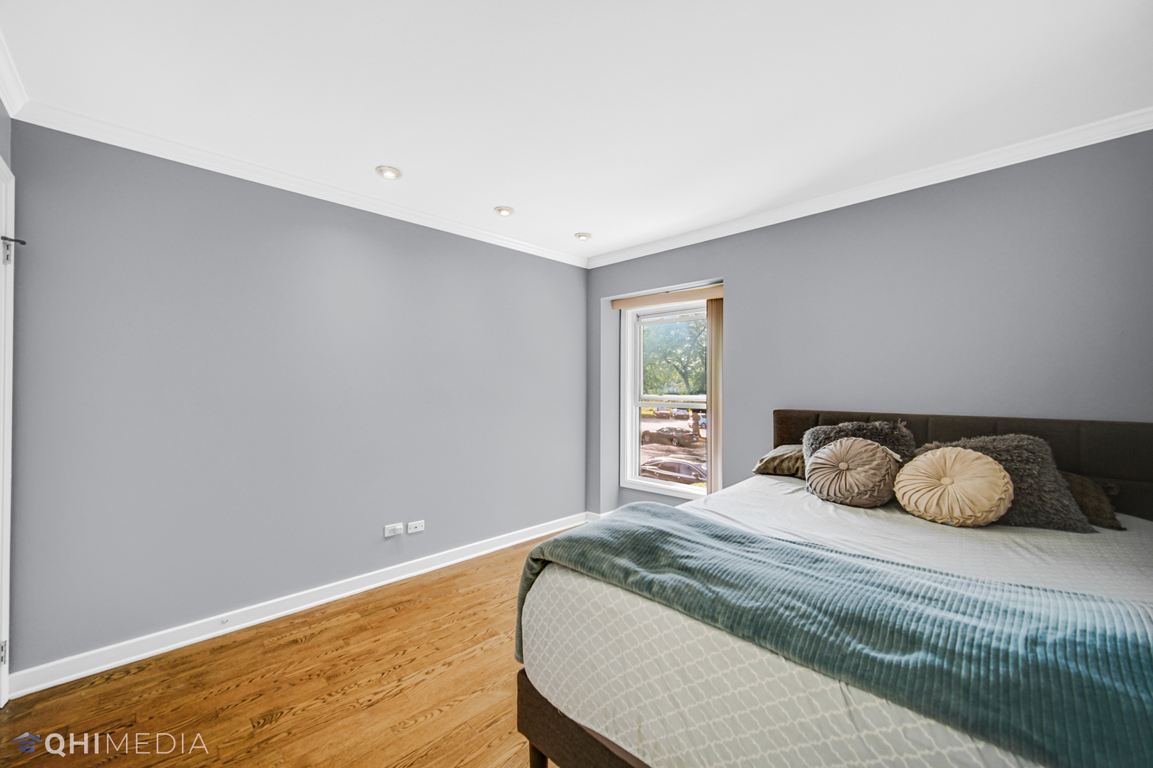 232 Inverrary Lane, Unit 232 Deerfield, IL 60015 - Photo 12 of 27 a bedroom with a bed and window