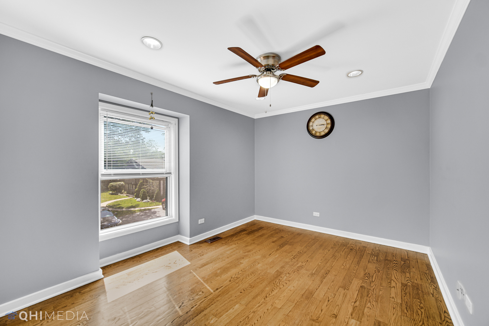 232 Inverrary Lane, Unit 232 Deerfield, IL 60015 - Photo 16 of 27 an empty room with windows and fan
