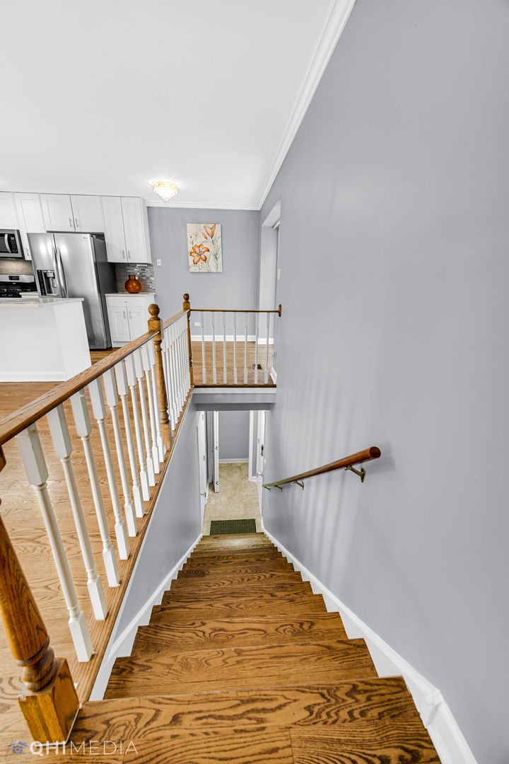 232 Inverrary Lane, Unit 232 Deerfield, IL 60015 - Photo 17 of 27 a view of a hallway with staircase