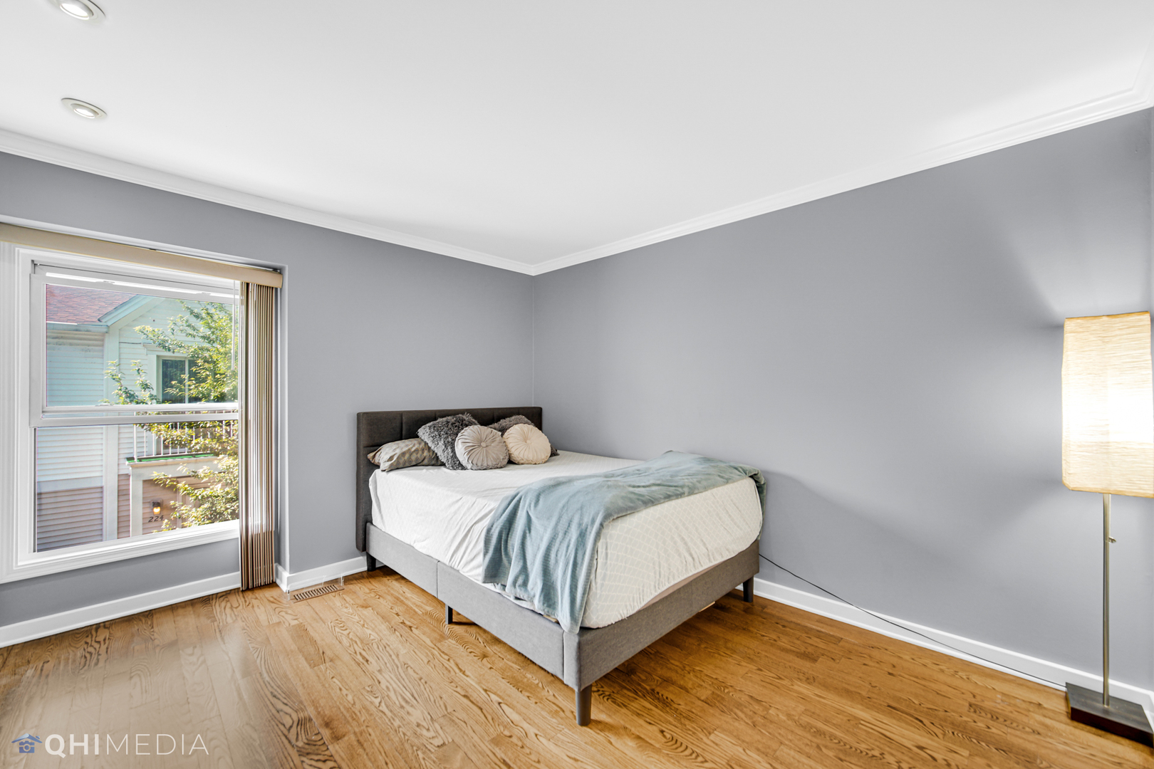 232 Inverrary Lane, Unit 232 Deerfield, IL 60015 - Photo 8 of 27 a bed sitting in a bedroom next to a window