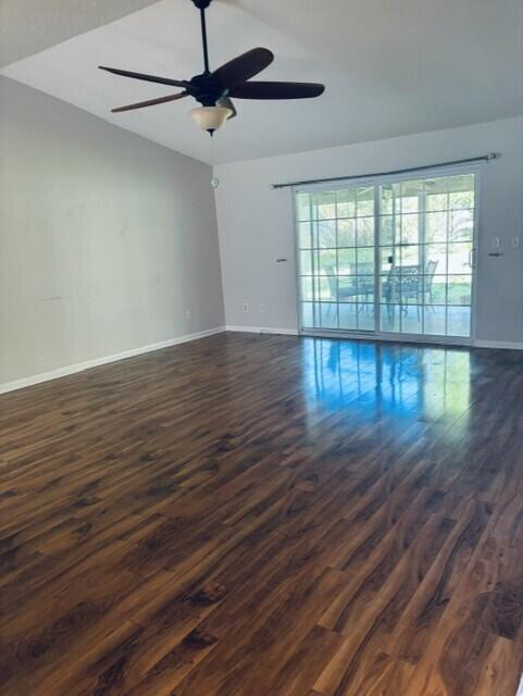 402 Juniper Street Destin, FL 32541 - Photo 3 of 20 a view of empty room with wooden floor and fan