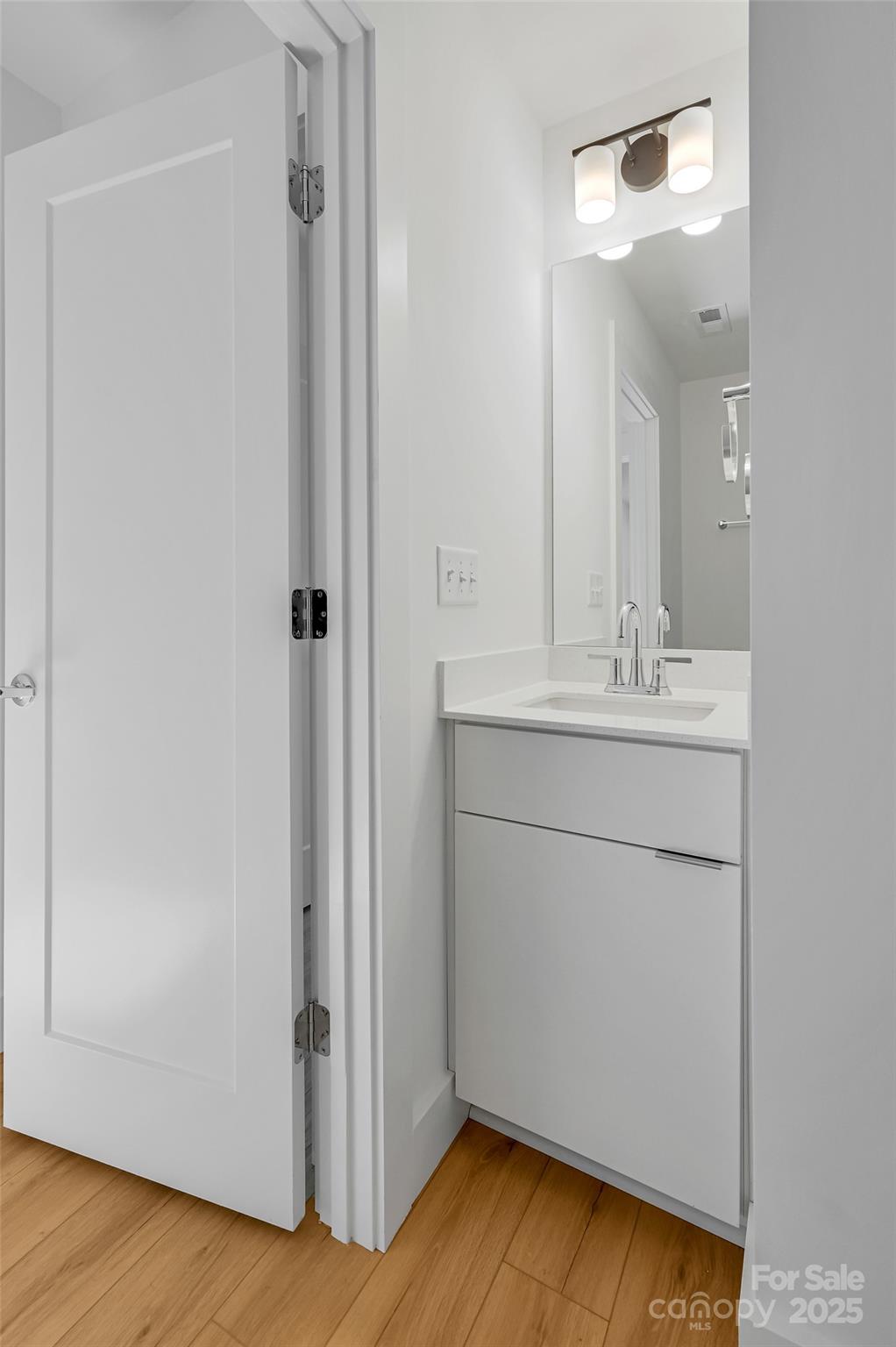 2 Cub Road Asheville, NC 28806 - Photo 15 of 24 a bathroom with a sink and a mirror