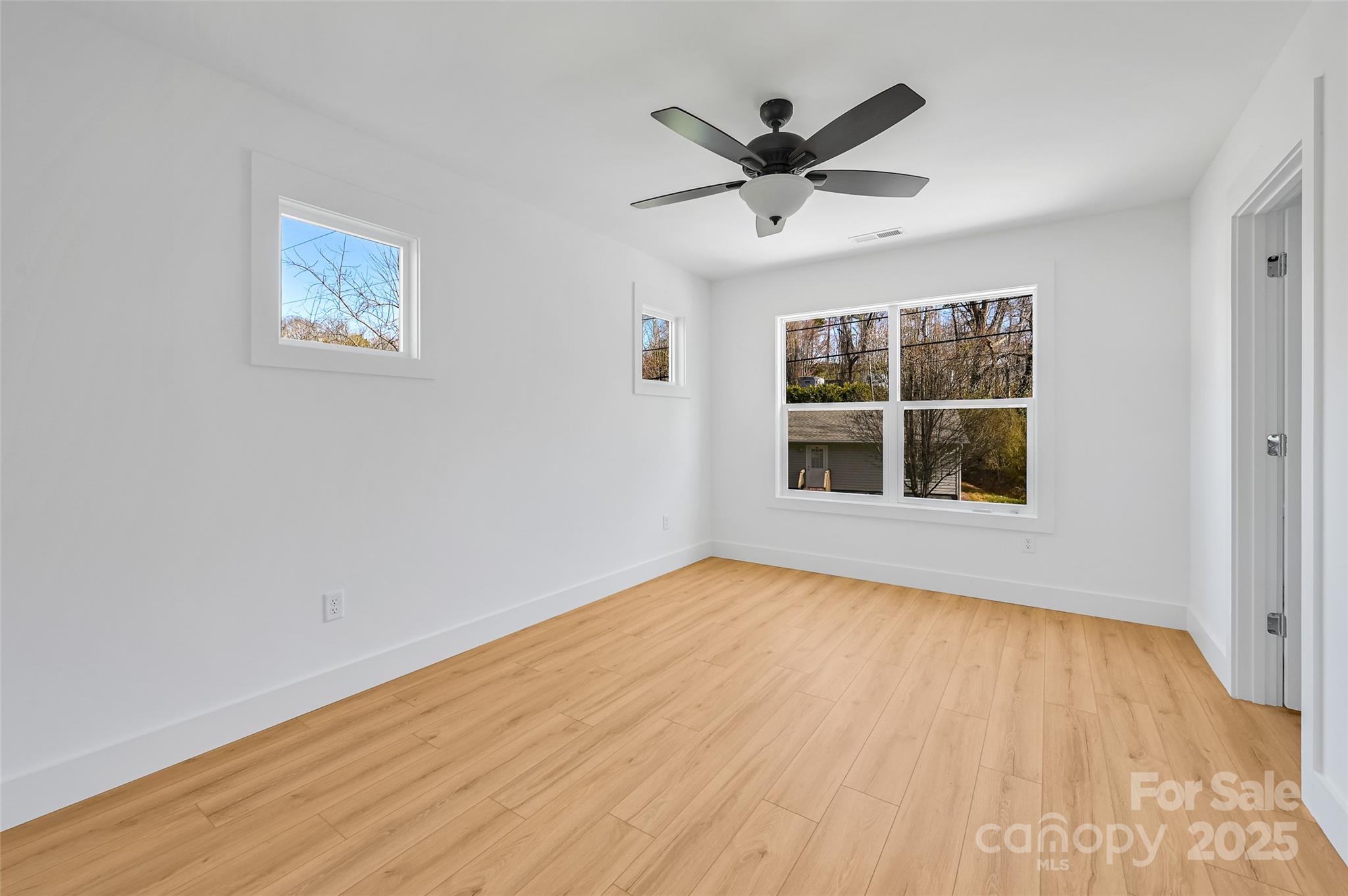 2 Cub Road Asheville, NC 28806 - Photo 17 of 24 a view of empty room with wooden floor and window