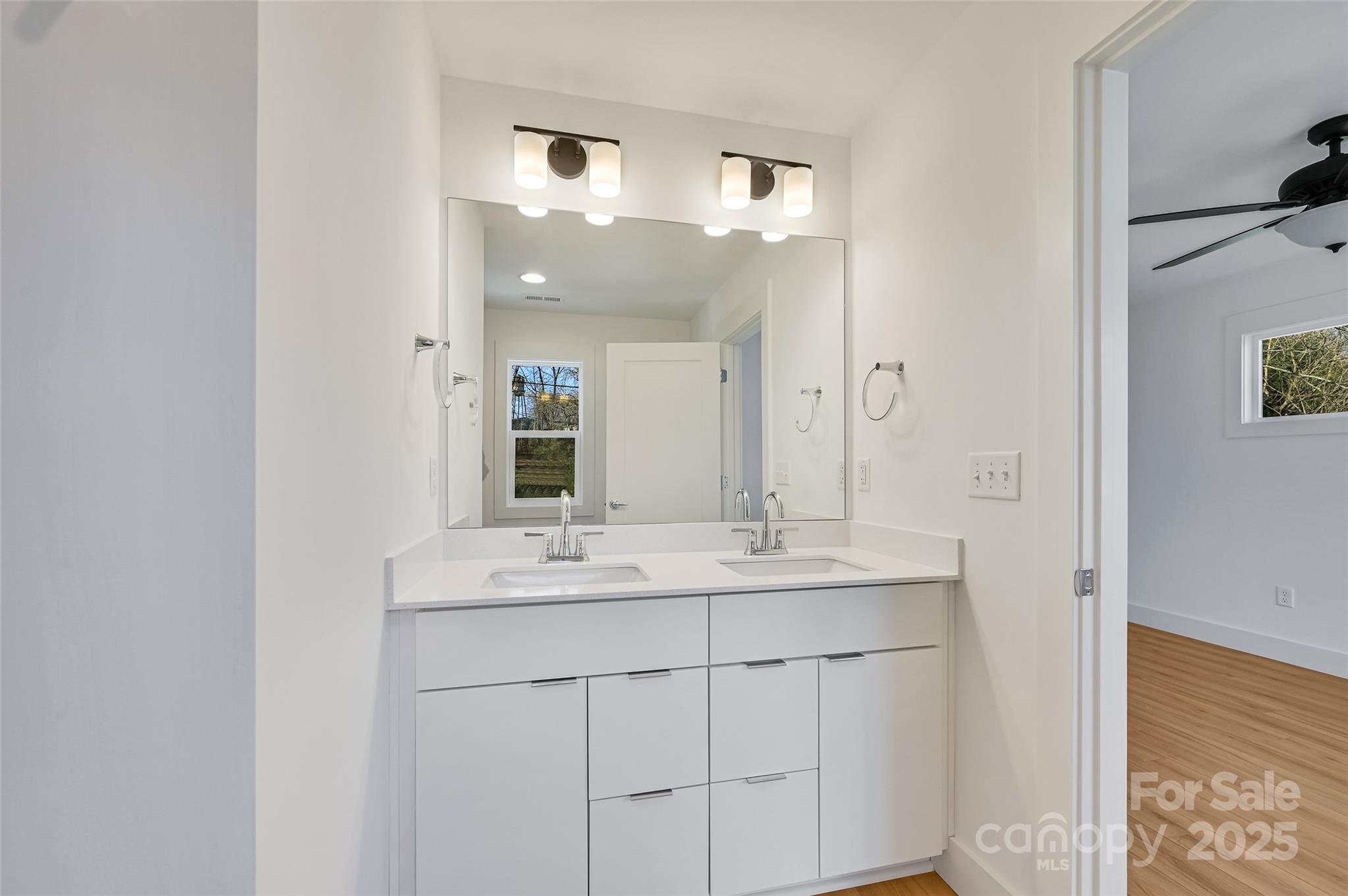 2 Cub Road Asheville, NC 28806 - Photo 20 of 24 a bathroom with a sink and a mirror