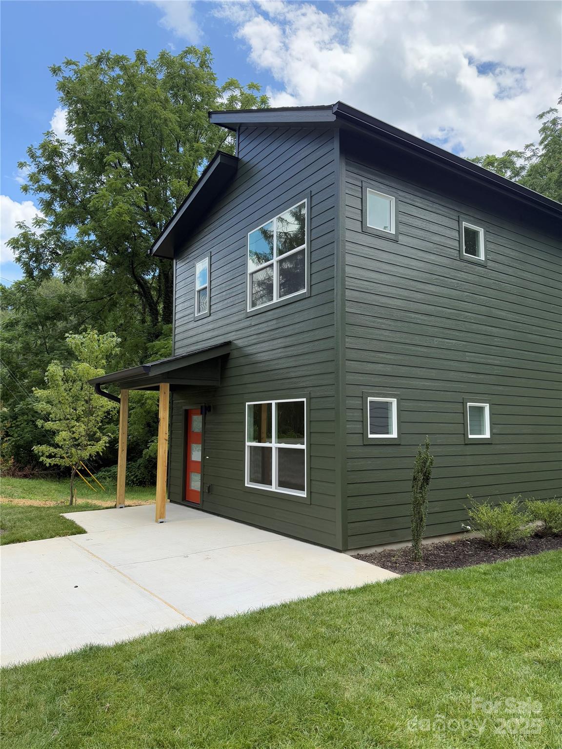 2 Cub Road Asheville, NC 28806 - Photo 24 of 24 a front view of a house with a yard and garage