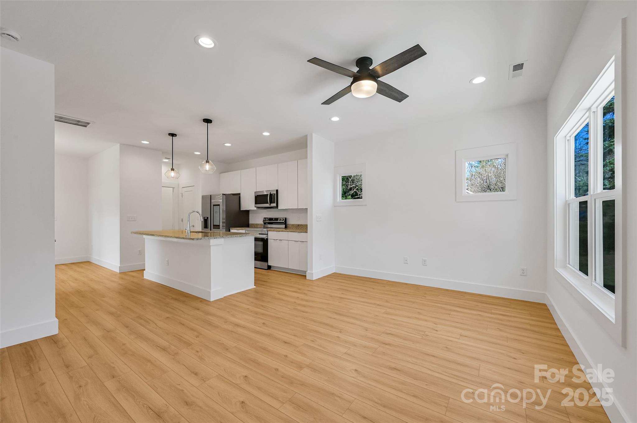 2 Cub Road Asheville, NC 28806 - Photo 4 of 24 a view of kitchen with cabinets and wooden floor