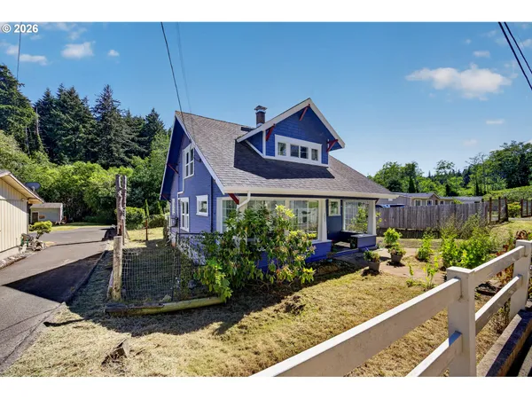 a front view of house with yard outdoor seating and entertaining space