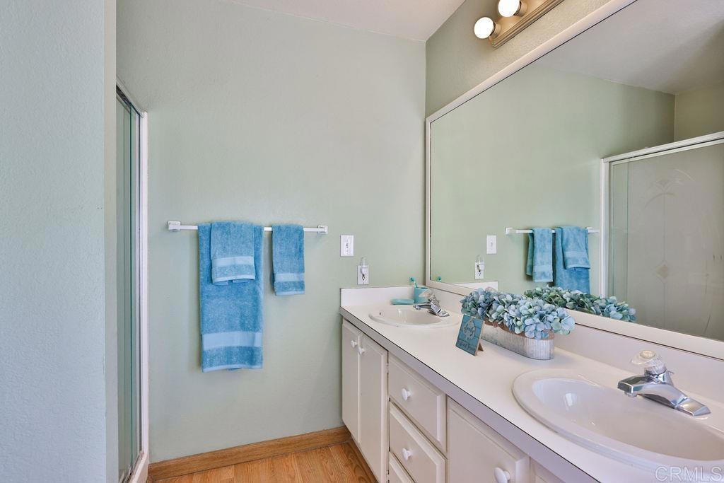15935 Spring Oaks Road, Unit SPC 169 El Cajon, CA 92021 - Photo 12 of 24 a bathroom with a sink and a mirror