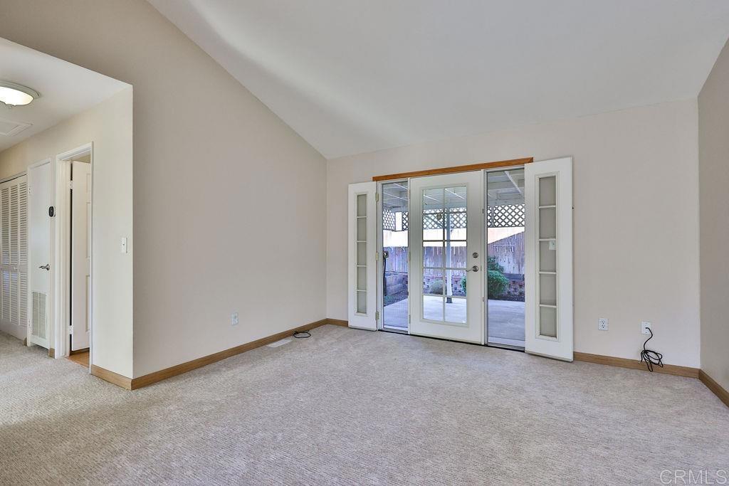 15935 Spring Oaks Road, Unit SPC 169 El Cajon, CA 92021 - Photo 4 of 24 a view of an empty room with a sliding door