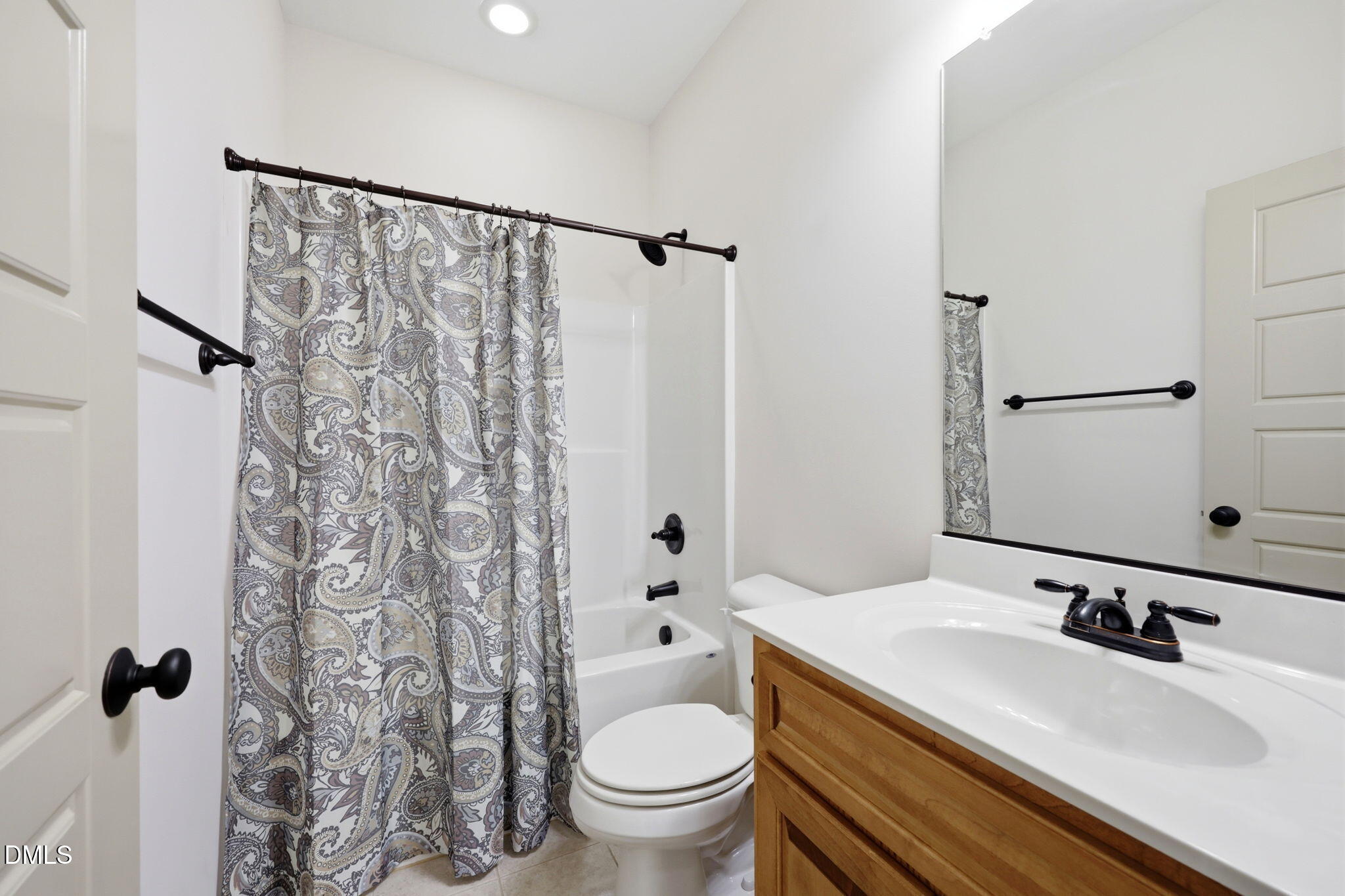 3587 Hannah Creek Road Benson, NC 27504 - Photo 25 of 43 a bathroom with a sink toilet and shower