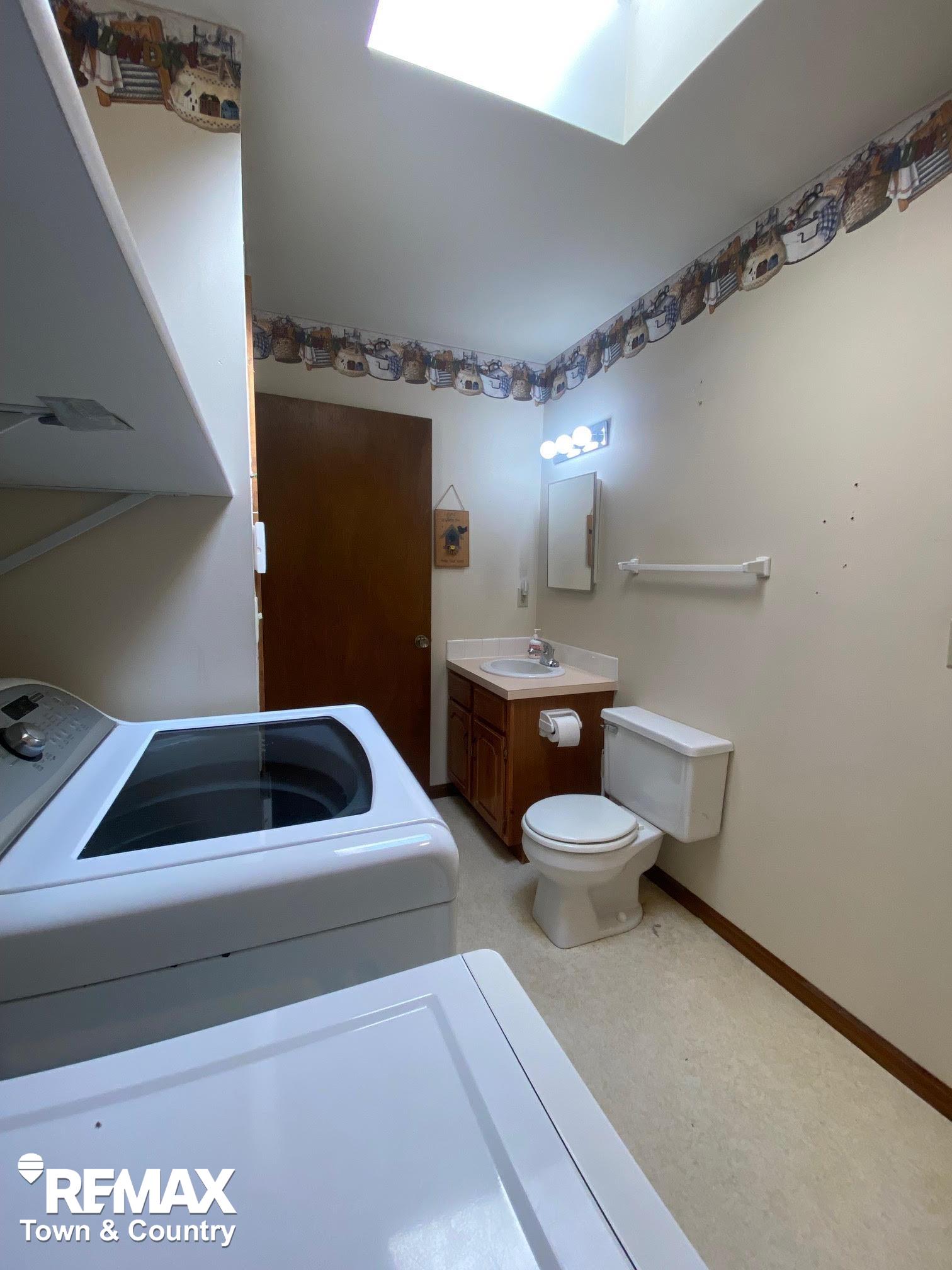 10388 Rene Drive Clio, MI 48420 - Photo 15 of 31 Main Floor Laundry