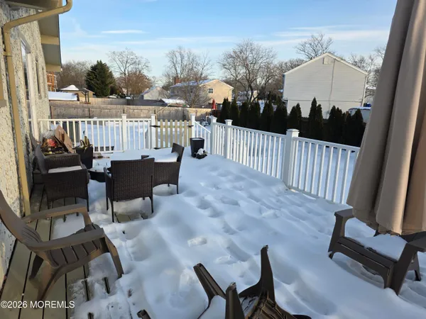 a view of balcony with furniture
