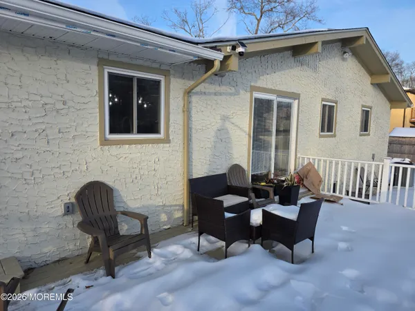 a building outdoor space with patio furniture