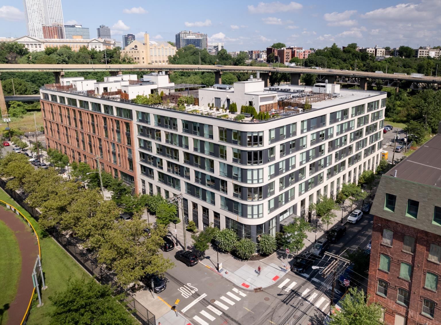 a view of a city with tall buildings