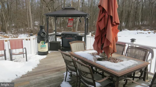 a view of a chairs with a table and chair and wooden floor