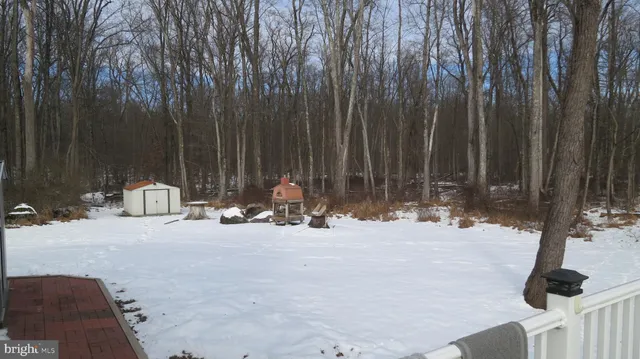 a view of swimming pool with seating space