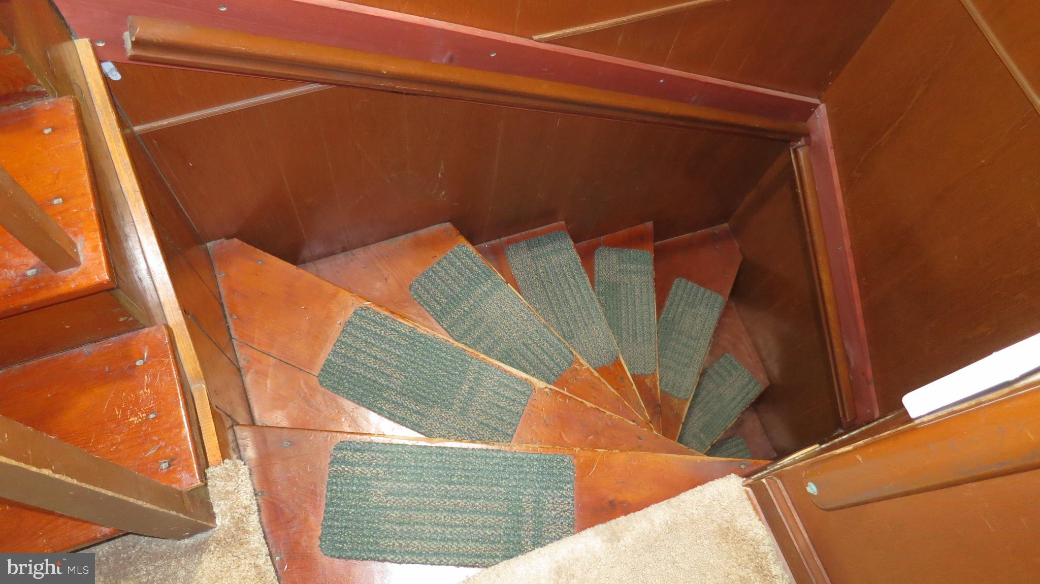 99 Lindbergh Road Hopewell, NJ 08525 - Photo 38 of 64 Spiral staircase with cozy green accents.