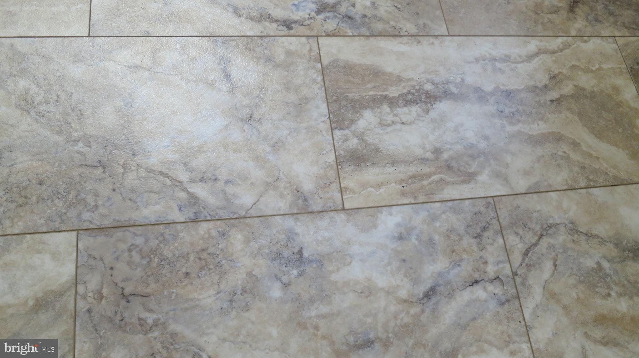 99 Lindbergh Road Hopewell, NJ 08525 - Photo 40 of 64 Elegant stone-patterned flooring design.