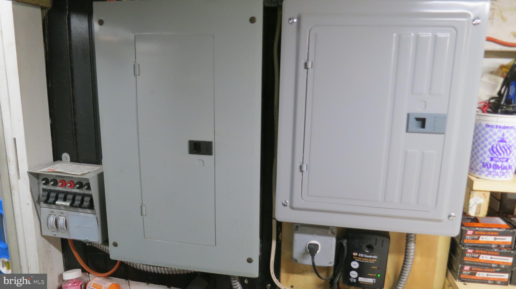 99 Lindbergh Road Hopewell, NJ 08525 - Photo 53 of 64 Electrical panels in a utility space.