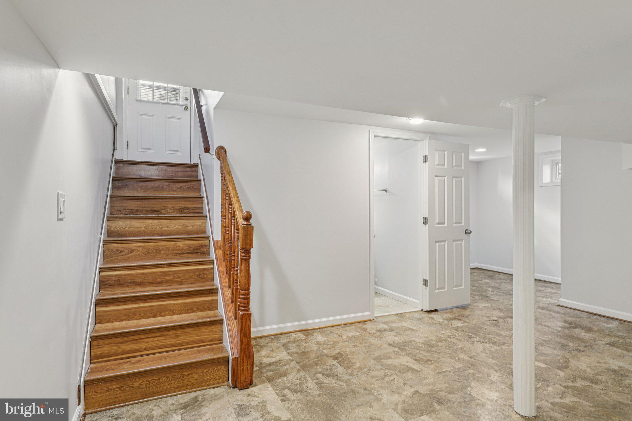 303 Brockton Road Oxon Hill, MD 20745 - Photo 23 of 48 connecting stairs to basement/rear door