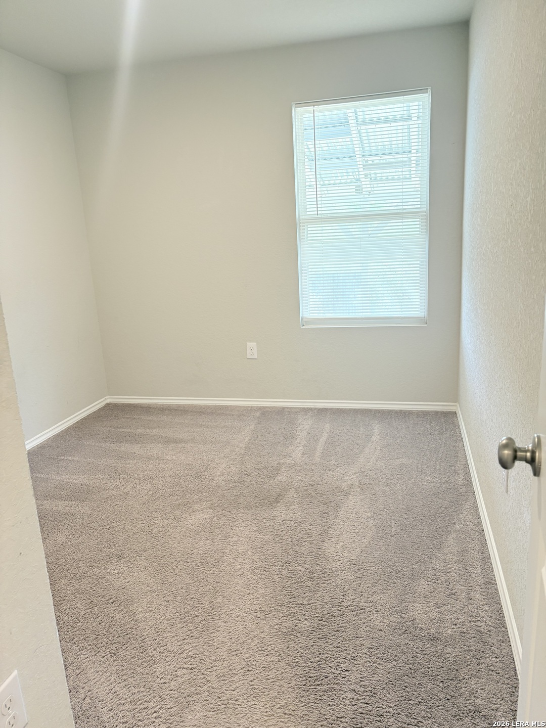 7022 Sunspot Converse, TX 78109 - Photo 7 of 18 an empty room with a window