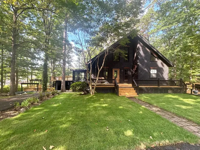 a view of a park with swings and slides