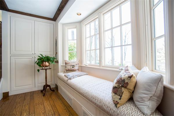 85 Myles Standish Road Weston, MA 02493 - Photo 22 of 28 a bedroom with a bed and a large window with wooden floor