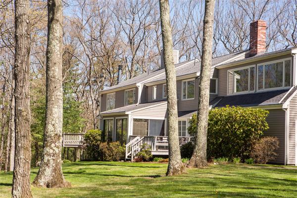 85 Myles Standish Road Weston, MA 02493 - Photo 3 of 28 a front view of a house with a garden